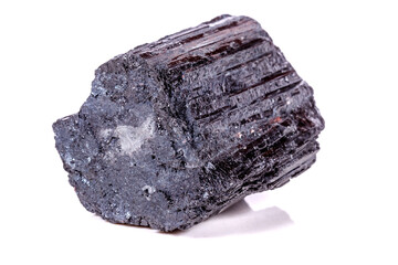 macro mineral stone sherle, schorl, black tourmaline on white background