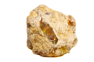 Macro Opal mineral stone in rock on white background