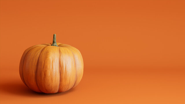 Seasonal background Image with copy-space. Pumpkin on Orange color. Fall Concept.