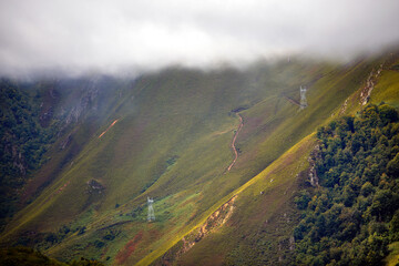 mountainous landscape with electric towers