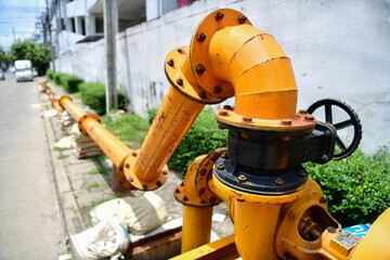 large water pump mounted on the drain pipe