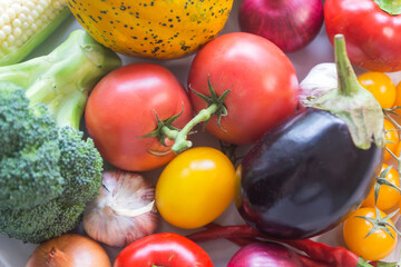 Healthy food background, photo of different fruits and vegetables on a wooden table.