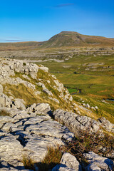 image of Limestone Pavement and Ingleborough in the Yorkshire Dales National Park, England, UK.