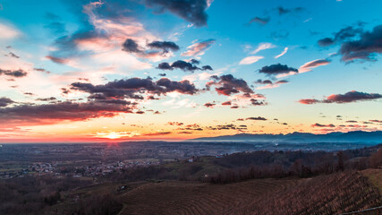 Colorful sunset in the italian vineyards