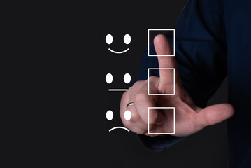 The finger presses the icon with a cheerful smile.