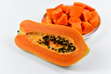 Tropical papaya fruit slices in dish