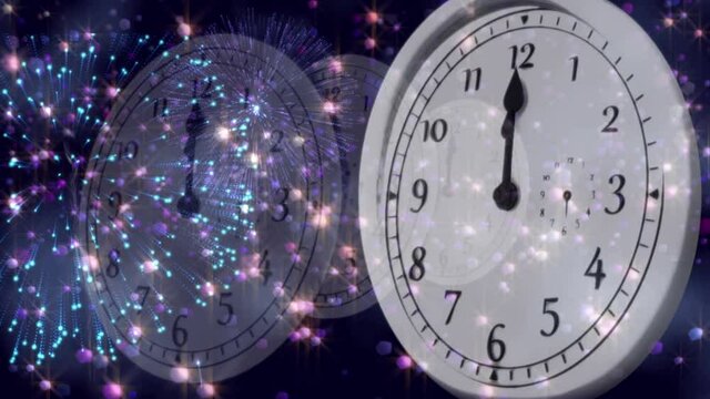 Animation of happy new year text with fireworks exploding and glowing lights over moving clock