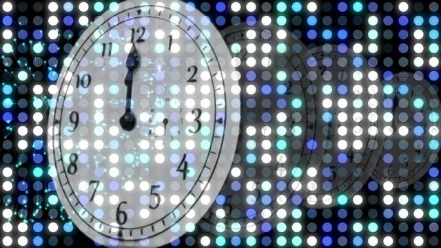 Animation of happy new year text with fireworks exploding and glowing spots over moving clock