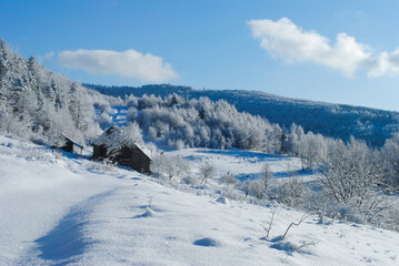 Fototapeta na wymiar Winter mountain landscape on a sunny day, Beskids, Poland