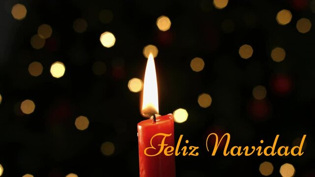 Animation of feliz navidad text over candle