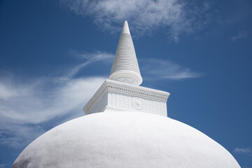 A stupa is a mound-like or hemispherical structure containing relics that is used as a place of meditation.