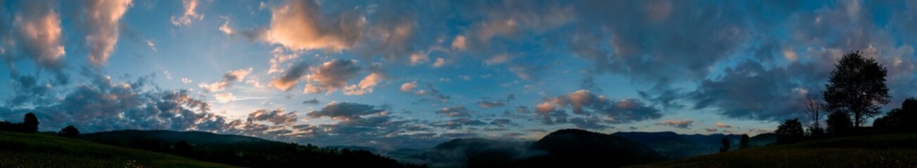 Panorama of internet station on the background of evening sky and forest