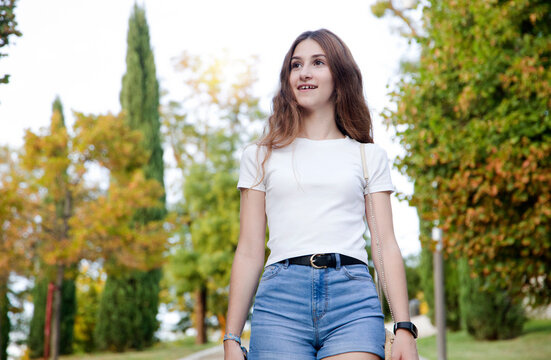 Teenager Surprised By A Landscape Of Trees