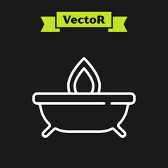 White line Aroma candle icon isolated on black background. Vector