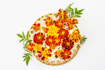 Autumn composition from assorted marigold flowers, isolated on a white background