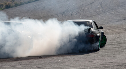 Masters of drift.  Behind the smoke. © JackUli