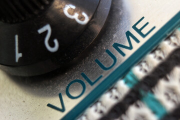 Close-up of dusty guitar amplifier volume