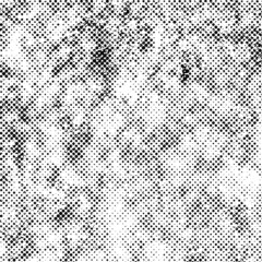 Halftone dotted grungy backdrop. Trendy distress dirty design element. Spotted circles. Overlay dots texture. Grungy style