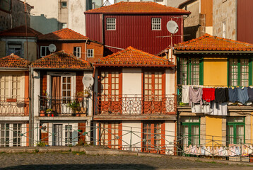 Fototapeta premium Traditional colorful houses on the old street of Porto vintage european buildings - Portugal