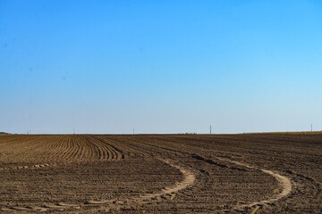 Fototapeta premium plowed field in spring