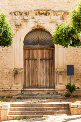 Front Door of Ex Chiesa del Gesu dei Padri Filippini in Comiso, Province of Ragusa, Sicily, Italy.