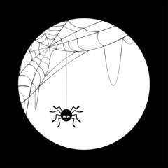 Halloween spider hanging on a string of cobwebs above full moon.