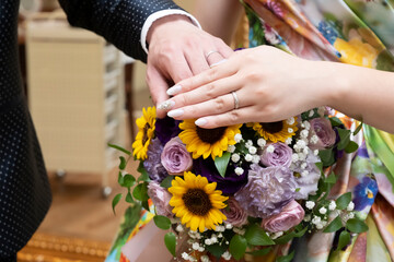 Fototapeta premium bride and groom holding hands