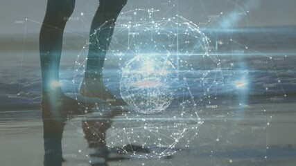 Animation of networks of connections with globe over caucasian woman walking on beach - Powered by Adobe