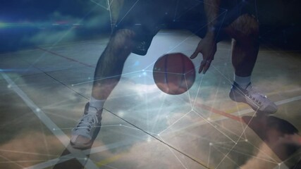 Animation of networks of connections over mixed race male basketball player at gym - Powered by Adobe