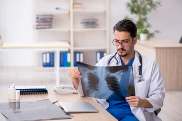 Young male doctor radiologist working in the clinic
