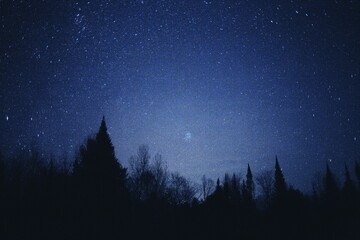 Starry night sky in Ontario, Canada. Astrophotography image of the constellation pleiades.