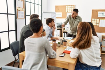 Fototapeta premium Group of business workers listening boss conference during meeting at the office.