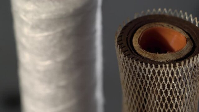Filters for water. New clean and old dirty filter cartridge rusty.
