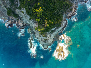 Breathtaking aerial scenery over the rocky beach of Mavraki in Skopelos island, Greece. It is...