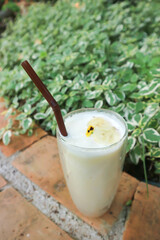 banana smoothie, milkshake or banana milkshake with whipping cream
