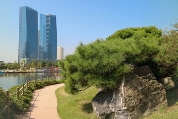 The expressway and the modern city skyline are in Korea
