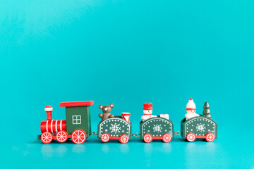 Children's Christmas train on a blue background, Merry Christmas Concept
