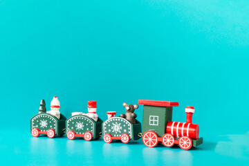 Children's Christmas train on a blue background, Merry Christmas Concept
