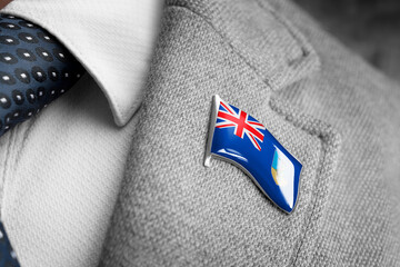 Metal badge with the flag of Montserrat on a suit lapel