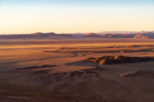 Amazing nature texture, aerial view of the red desert in Namibia, Africa.