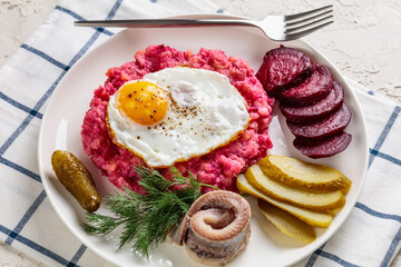 labskaus, mashed potatoes with the beet, fried egg