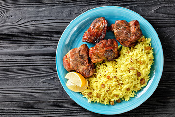 roasted meat served with raisins saffron rice