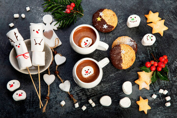 Christmas composition with hot chocolate and cookies.