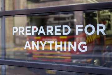 Prepared for Anything signage in window of fire station
