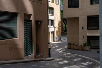 Fototapeta na wymiar empty alley way in city