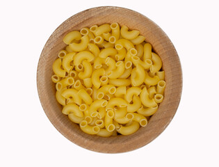 Raw italian pasta in wooden bowl isolated on white background, top view
