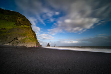The cliffs by the township of Vik in Iceland Reynisdrangar basalt sea stacks