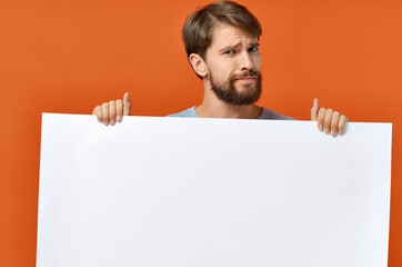 emotional man advertising marketing copy space orange background