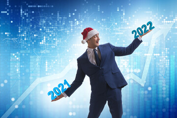 Businessman with new year 2021 to 2022
