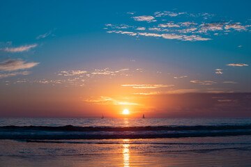 Sunset at the sea. Sunrise at beach. Colorful ocean beach sunrise.